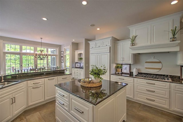4140 S Lake Ct, Decatur, IL 62521 - kitchen featuring white cabinetry, stainless steel gas stovetop, recessed lighting, and a sink