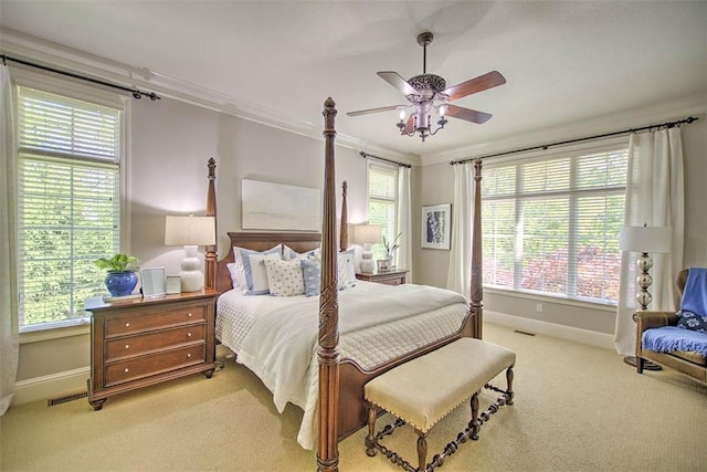 4140 S Lake Ct, Decatur, IL 62521 - bedroom with baseboards, ceiling fan, crown molding, and carpet floors