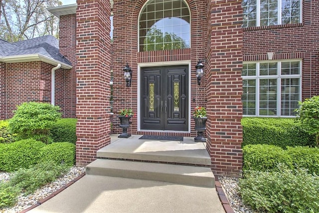 4140 S Lake Ct, Decatur, IL 62521 - view of exterior entry featuring french doors and brick siding