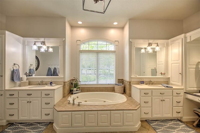 4140 S Lake Ct, Decatur, IL 62521 - full bathroom with a sink, two vanities, and plenty of natural light