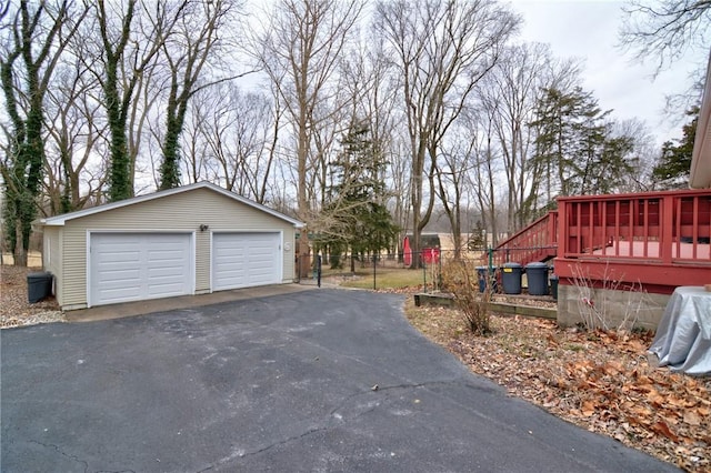 view of street with aphalt driveway