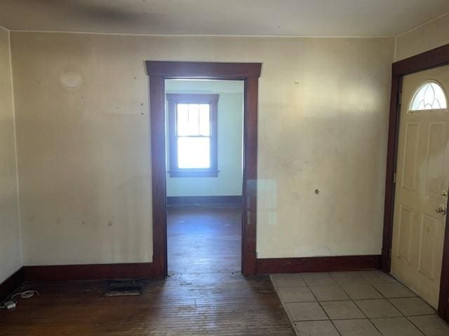 entryway with hardwood / wood-style flooring