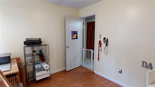 office area featuring hardwood / wood-style floors