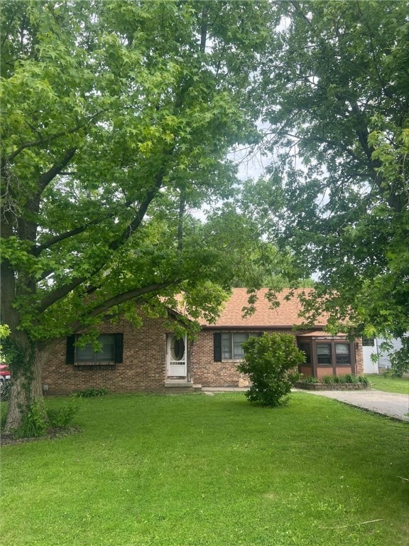 208 Roosevelt St, Paris, IL 61944 - view of front of property with a front lawn and brick siding