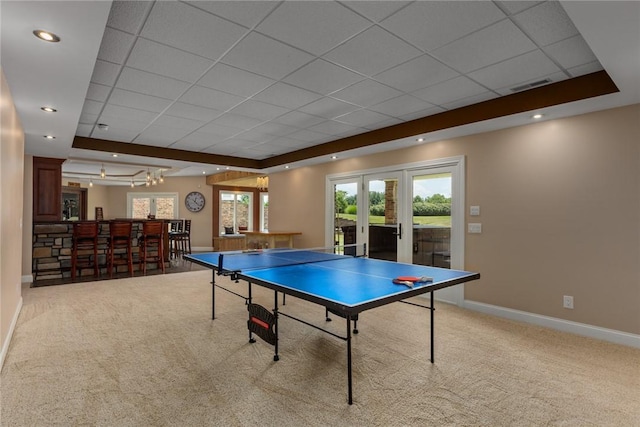 11107 E Cambridge Ln, Effingham, IL 62401 - playroom with a tray ceiling, a drop ceiling, carpet, and french doors