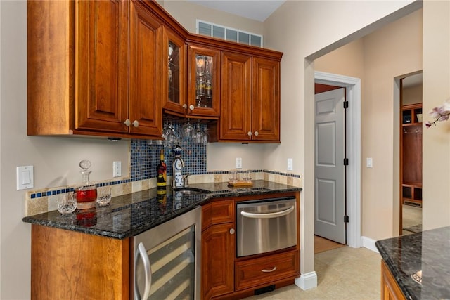 11107 E Cambridge Ln, Effingham, IL 62401 - kitchen featuring wine cooler, backsplash, dark stone countertops, and glass insert cabinets