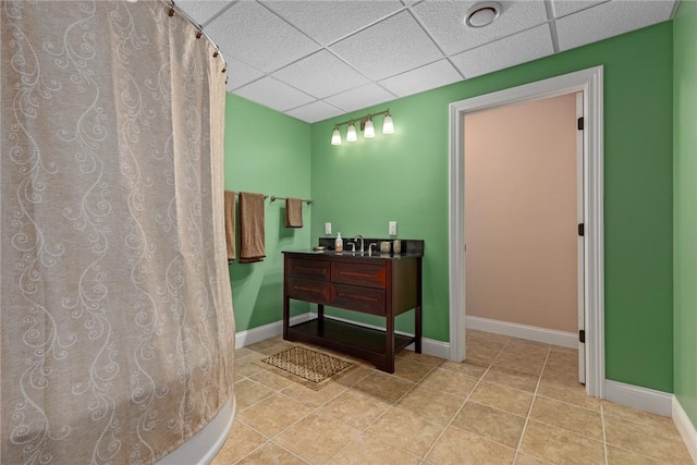 11107 E Cambridge Ln, Effingham, IL 62401 - full bath with a drop ceiling, vanity, tile patterned flooring, and a shower with shower curtain