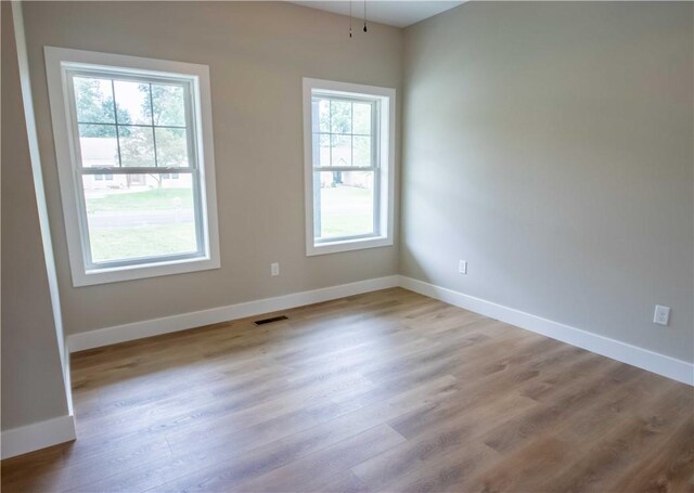 3812 Sonny Ln, Danville, IL 61832 - empty room with baseboards and wood finished floors