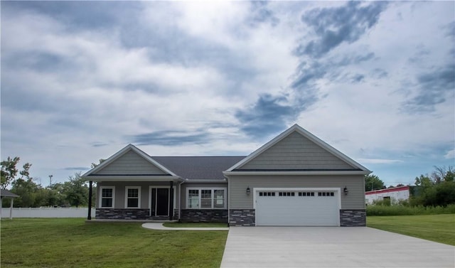3812 Sonny Ln, Danville, IL 61832 - craftsman house with an attached garage, driveway, and stone siding