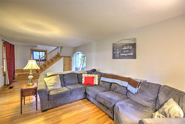 3985 E Cerro Gordo St, Decatur, IL 62521 - living room with light wood finished floors, healthy amount of natural light, and stairs