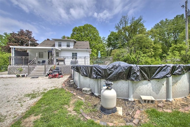 3985 E Cerro Gordo St, Decatur, IL 62521 - rear view of house featuring a covered pool