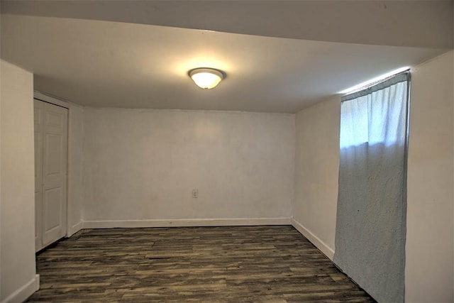 3985 E Cerro Gordo St, Decatur, IL 62521 - below grade area with dark wood finished floors and baseboards
