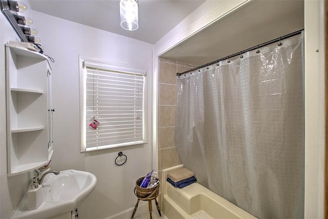 3985 E Cerro Gordo St, Decatur, IL 62521 - full bath featuring baseboards, a sink, and shower / bathtub combination with curtain