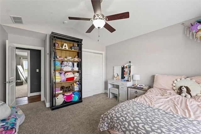 1121 Meadow Brook Ct, Mattoon, IL 61938 - carpeted bedroom with vaulted ceiling, a closet, and a ceiling fan