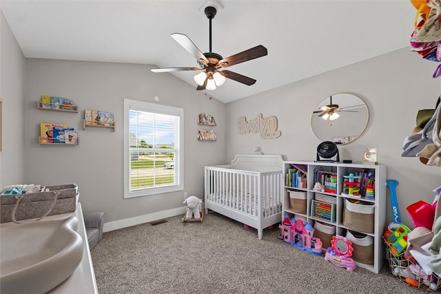 1121 Meadow Brook Ct, Mattoon, IL 61938 - carpeted bedroom featuring lofted ceiling, a ceiling fan, and a crib