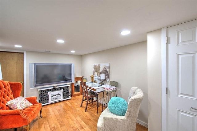 office area featuring hardwood / wood-style floors and recessed lighting