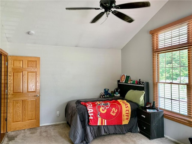 15690 E 1100th Ave, Effingham, IL 62401 - bedroom featuring lofted ceiling, carpet floors, multiple windows, and a ceiling fan