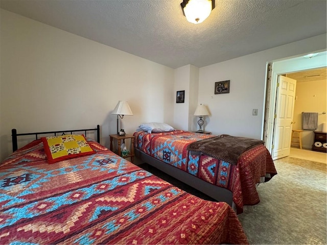 carpeted bedroom with a textured ceiling