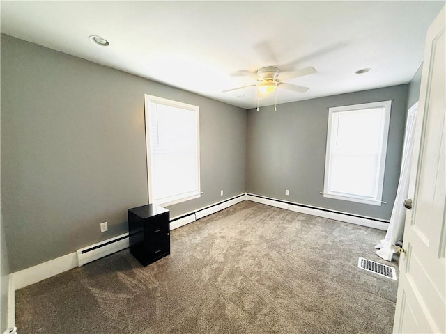 403 S 2nd Ave, Hoopeston, IL 60942 - unfurnished room featuring carpet, ceiling fan, baseboards, a baseboard radiator, and recessed lighting