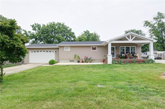 530 Sunset Dr, Mt Zion, IL 62549 - ranch-style house with a front yard, a porch, concrete driveway, and an attached garage