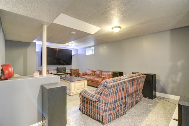 530 Sunset Dr, Mt Zion, IL 62549 - living room featuring a textured ceiling and baseboards