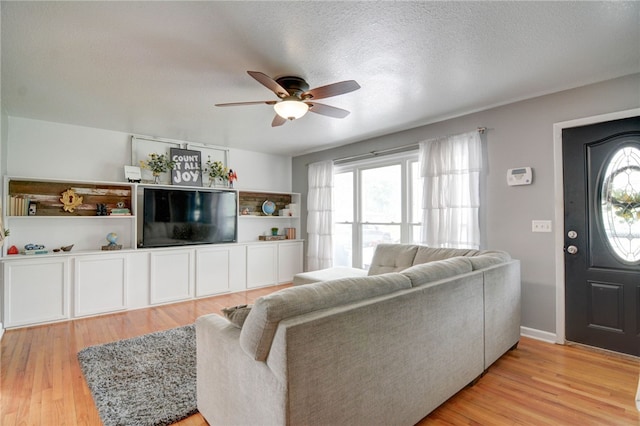 530 Sunset Dr, Mt Zion, IL 62549 - living room with ceiling fan and light wood-type flooring