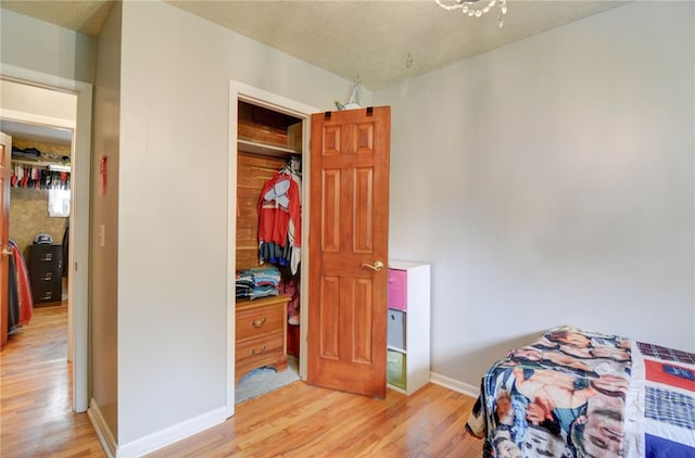 530 Sunset Dr, Mt Zion, IL 62549 - bedroom with light wood-style floors and baseboards