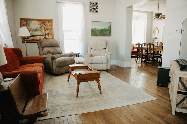 403 Maple St, Marshall, IL 62441 - living area with hardwood / wood-style floors, plenty of natural light, and ceiling fan