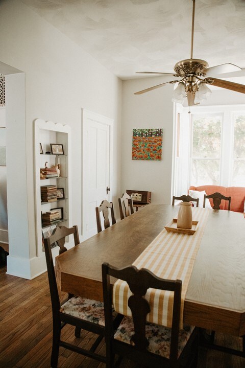 403 Maple St, Marshall, IL 62441 - dining room featuring a ceiling fan and wood finished floors