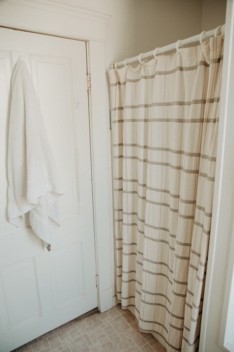 403 Maple St, Marshall, IL 62441 - full bath featuring a shower with shower curtain