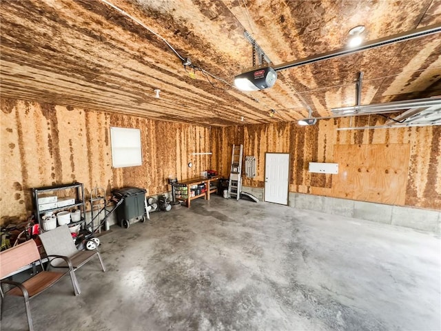 106 N Jefferson St, Greenup, IL 62428 - garage featuring a garage door opener
