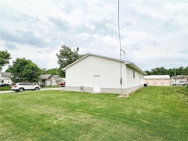 106 N Jefferson St, Greenup, IL 62428 - view of home's exterior featuring a lawn