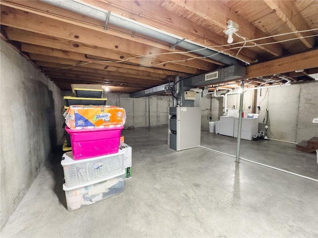 106 N Jefferson St, Greenup, IL 62428 - unfinished basement with washing machine and clothes dryer