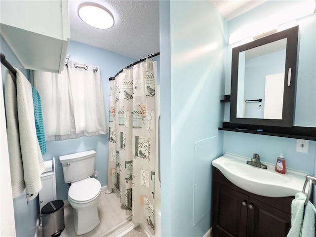 106 N Jefferson St, Greenup, IL 62428 - full bath with a textured ceiling, vanity, toilet, a shower with curtain, and wood finished floors