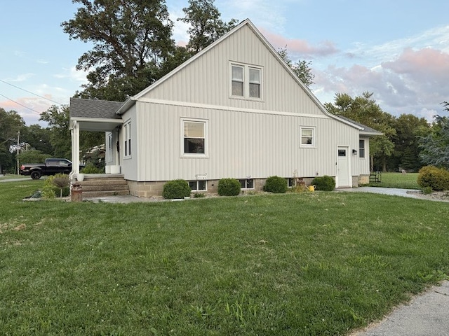 303 E Glenwood Ave, Olney, IL 62450 - view of side of home featuring a lawn