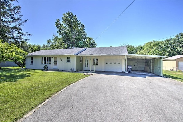 125 W Walnut St, Mt Zion, IL 62549 - ranch-style home featuring driveway, a carport, and a front lawn