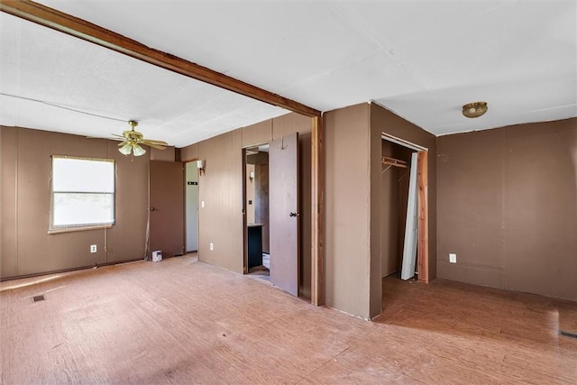 spare room with visible vents and a ceiling fan