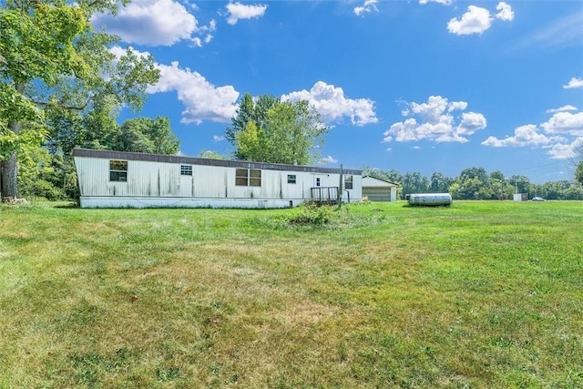 back of house with a yard