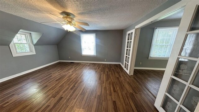 3728 N Lake Blvd, Danville, IL 61832 - bonus room with plenty of natural light, a textured ceiling, a ceiling fan, baseboards, and wood finished floors