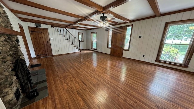 3728 N Lake Blvd, Danville, IL 61832 - unfurnished living room featuring wood finished floors, beamed ceiling, stairs, a ceiling fan, and a fireplace