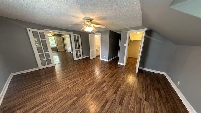 3728 N Lake Blvd, Danville, IL 61832 - bonus room featuring a ceiling fan, dark wood finished floors, baseboards, a textured ceiling, and french doors