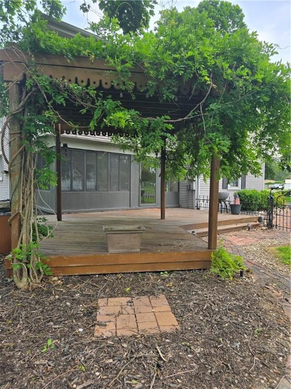 3728 N Lake Blvd, Danville, IL 61832 - wooden terrace featuring a sunroom