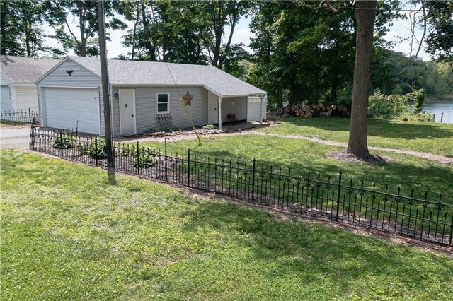 3728 N Lake Blvd, Danville, IL 61832 - view of front of home featuring driveway, an attached garage, and roof with shingles