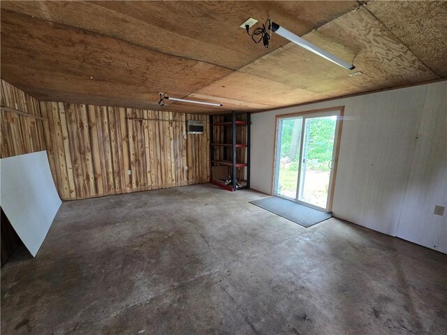 3728 N Lake Blvd, Danville, IL 61832 - garage with wood walls and a wall mounted AC