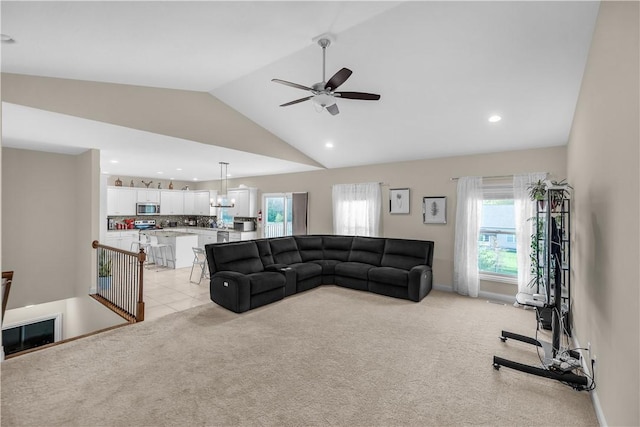 living area with ceiling fan, light colored carpet, recessed lighting, and lofted ceiling