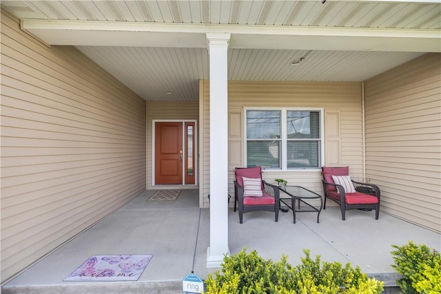 doorway to property with covered porch