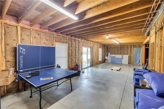 playroom featuring concrete flooring