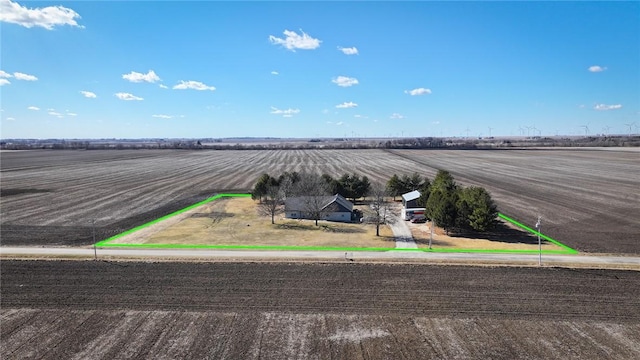 view of parking / parking lot featuring a rural view