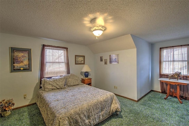 bedroom featuring carpet flooring, a textured ceiling, and baseboards