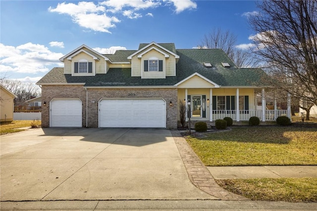 view of front of house with a garage and covered porch